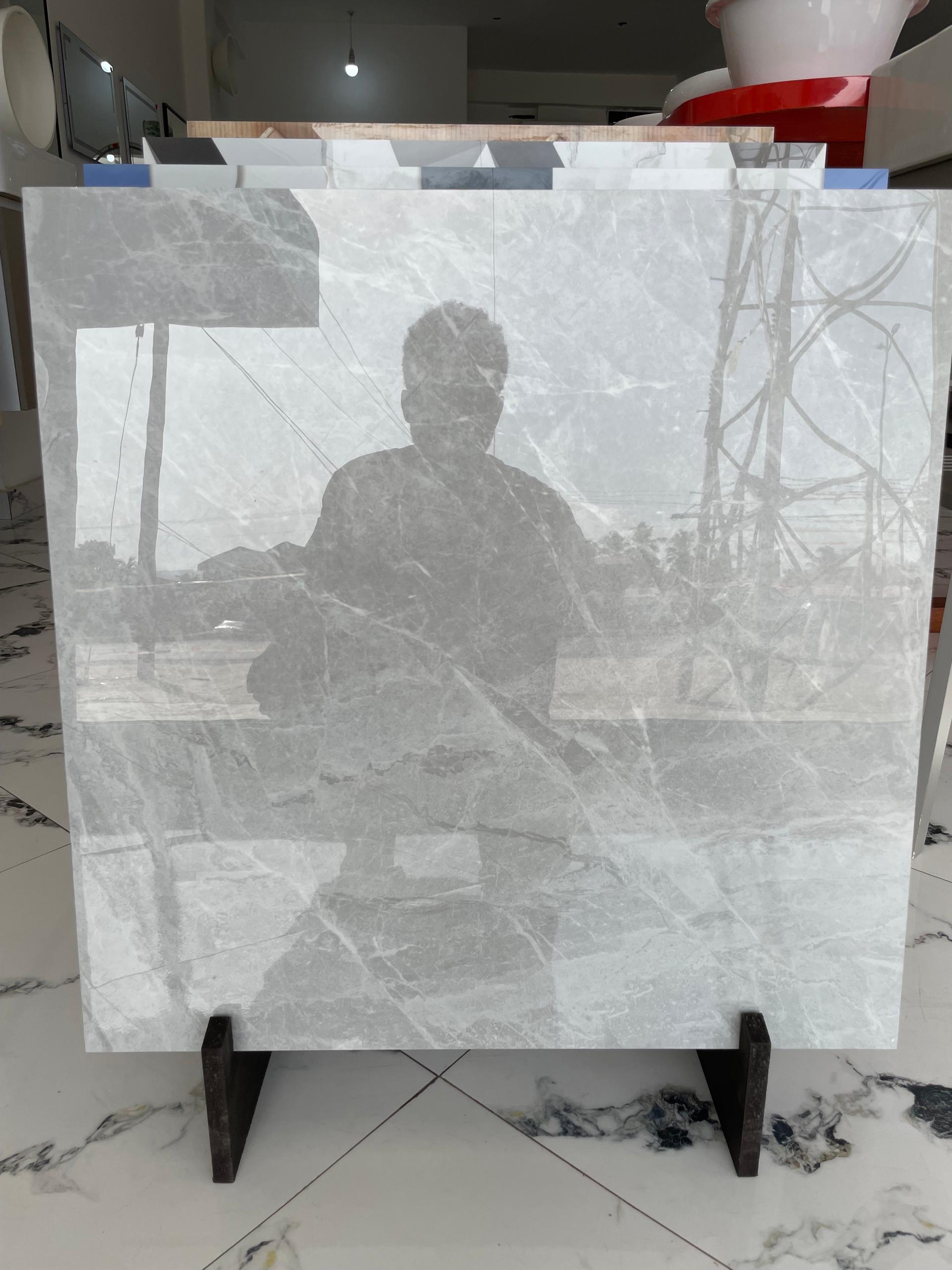 60/60 polished tiles with subtle marble effect